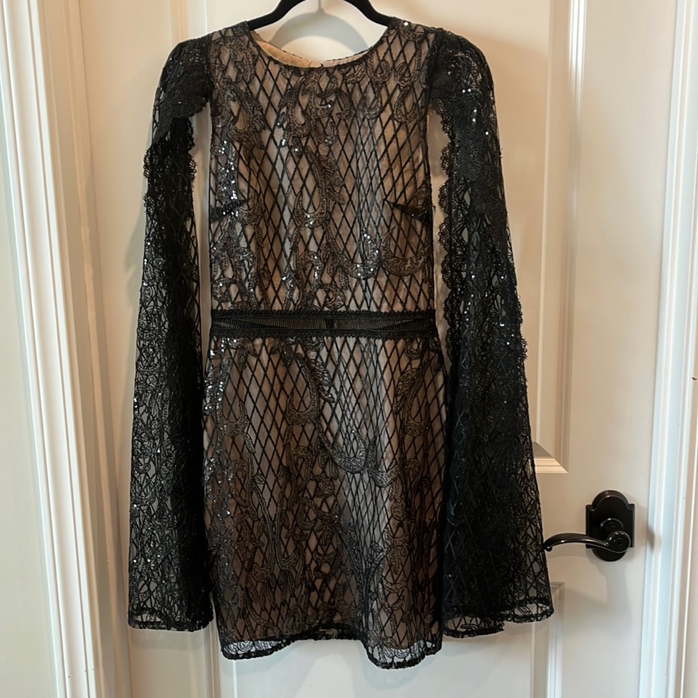 Black sequin dress with cape sleeves